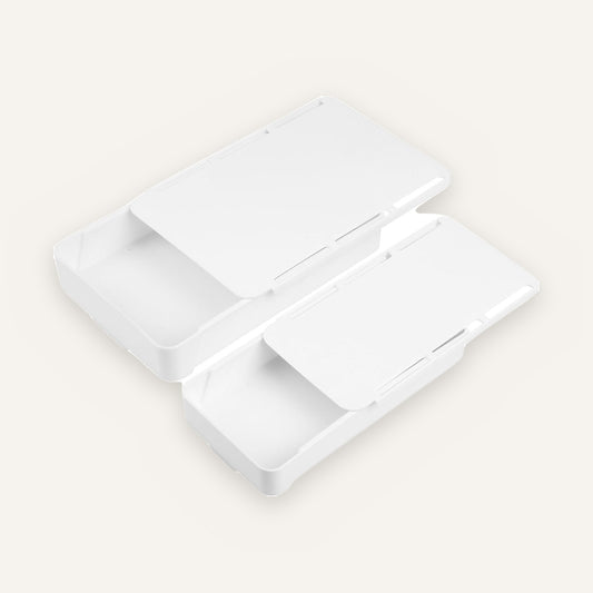 Under-desk drawer 2-pack: one large and one small white pull-out drawer, lids partly open.