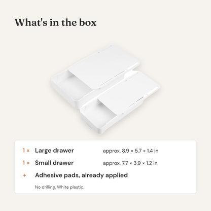 What's in the box: one large and one small white drawer with adhesive pads already applied.